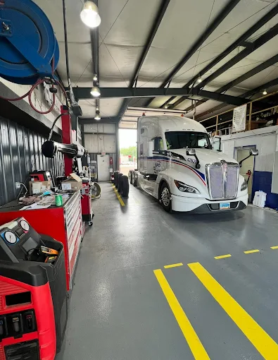 Semi truck in shop for fleet maintenance